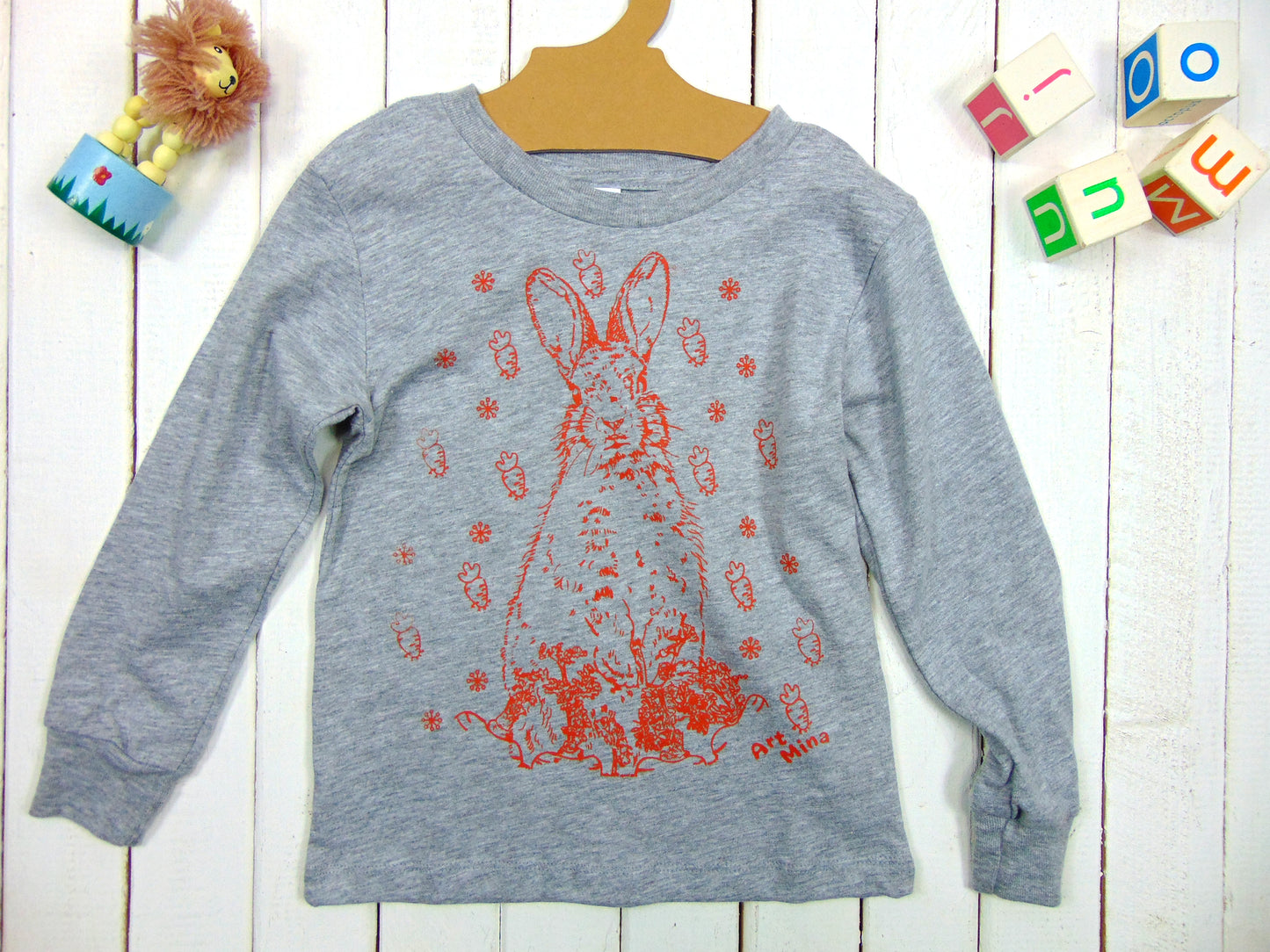 A photo of Art Mina Kids Long Sleeve T-shirt "Bunny Carrot"