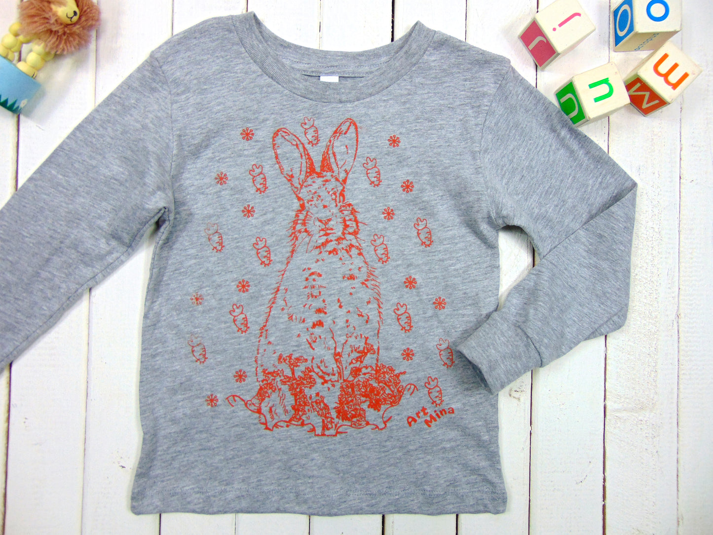 A photo of Art Mina Kids Long Sleeve T-shirt "Bunny Carrot"