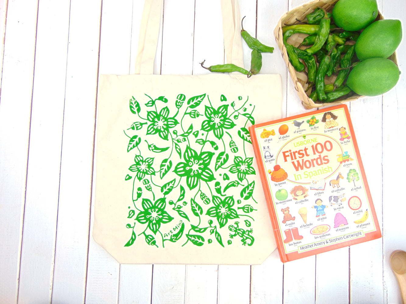 A photo of Art Mina Canvas Tote Bag "Aunty's Shishito Pepper Garden with Lucky Gecko "