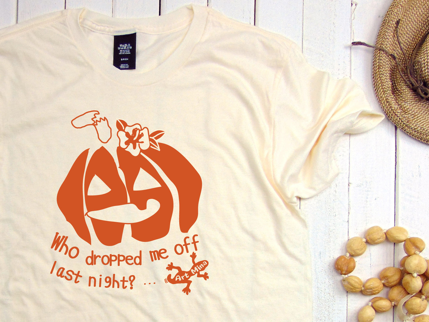 Screen-printed Jack O’Lantern saying “Who dropped me off?” unisex soft T-shirt