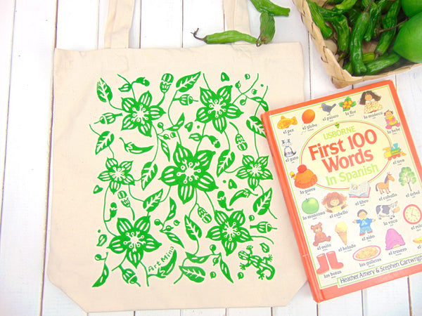 A photo of Art Mina Canvas Tote Bag "Aunty's Shishito Pepper Garden with Lucky Gecko "